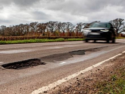 Can I Sue the City if a Pothole Caused a Car Image